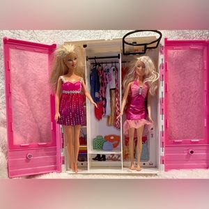 2 Beautiful Dolls and a Barbie Closet/ Case.